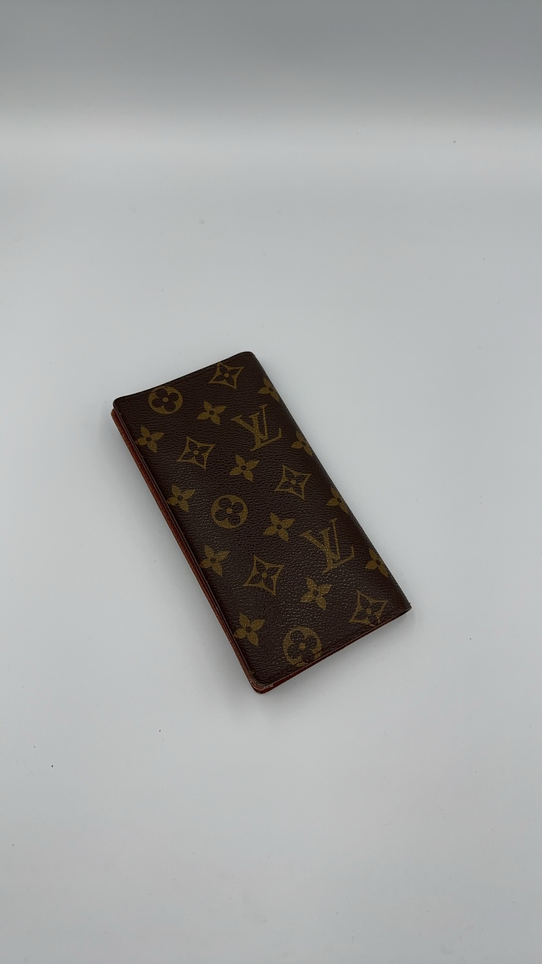 ヴィトン　モノグラム　二つ折り長財布　MI0988
